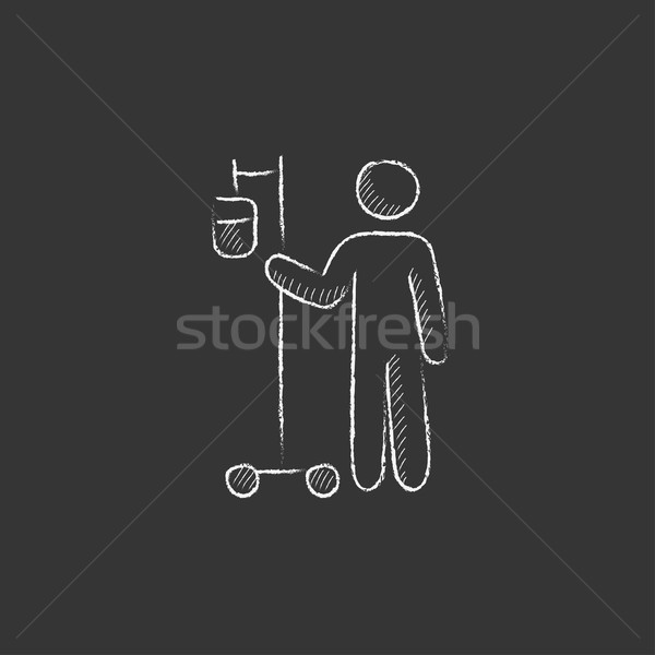Patient standing with intravenous dropper. Drawn in chalk icon. Stock photo © RAStudio