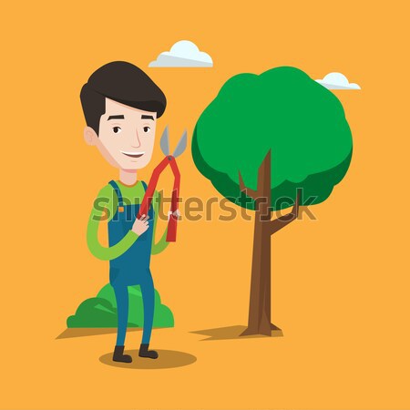 Farmer with pruner in garden vector illustration. Stock photo © RAStudio