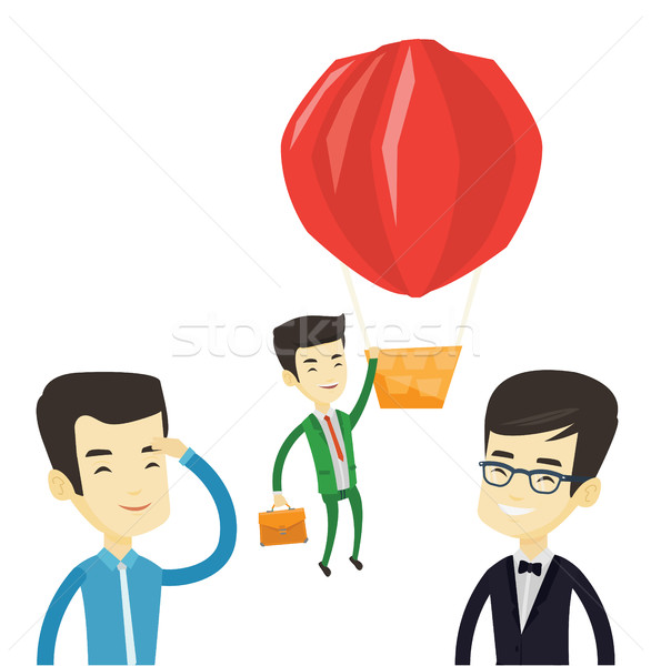 Business man hanging on balloon. Stock photo © RAStudio
