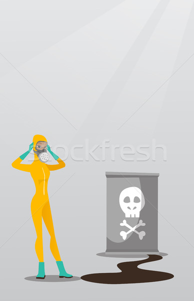 Stock photo: Woman in radiation protective suit.