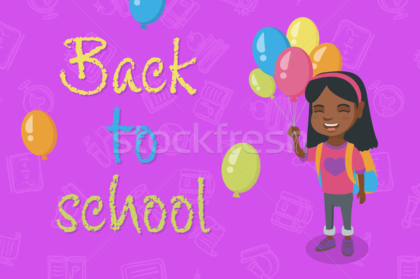 Stock photo: Caucasian schoolgirl with the bunch of balloons.