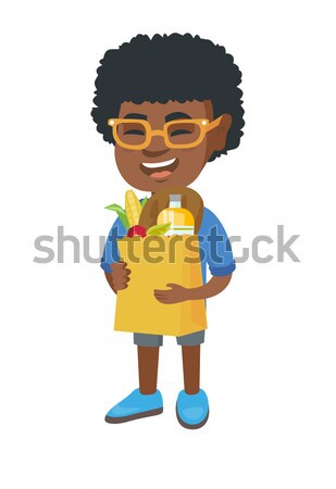 African boy playing with a radio-controlled car. Stock photo © RAStudio