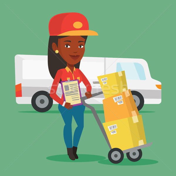 Delivery courier with cardboard boxes. Stock photo © RAStudio