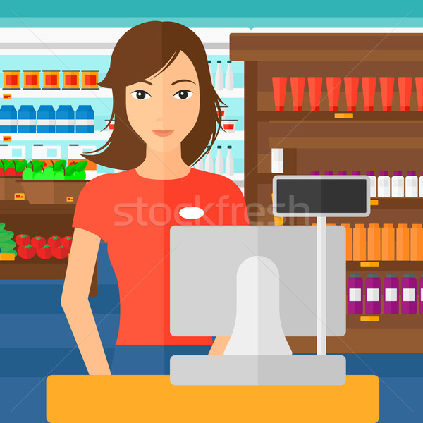Saleslady standing at checkout. Stock photo © RAStudio