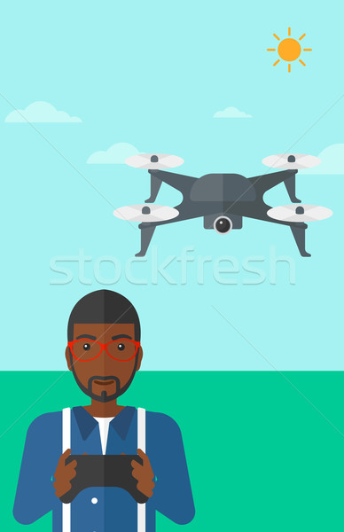 Man flying drone. Stock photo © RAStudio