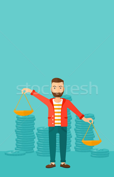 Businessman with scales. Stock photo © RAStudio