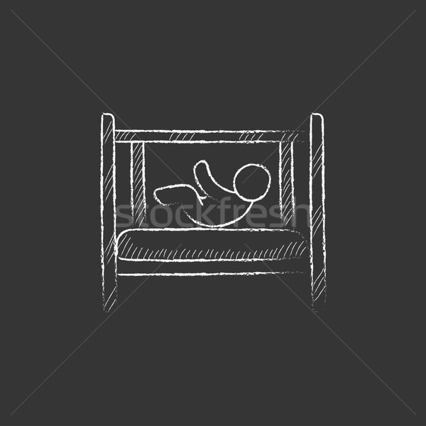 Baby laying in crib. Drawn in chalk icon. Stock photo © RAStudio