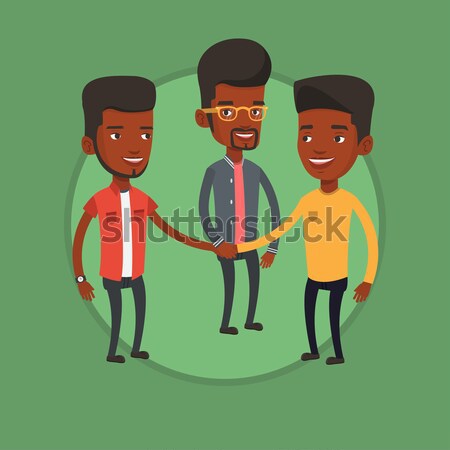 Group of businessmen joining hands. Stock photo © RAStudio
