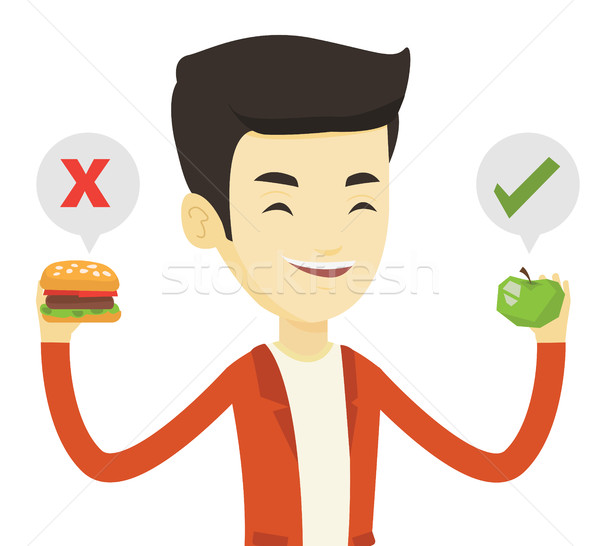 Man choosing between hamburger and cupcake. Stock photo © RAStudio