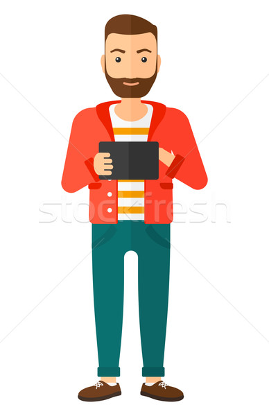 Man using tablet computer. Stock photo © RAStudio