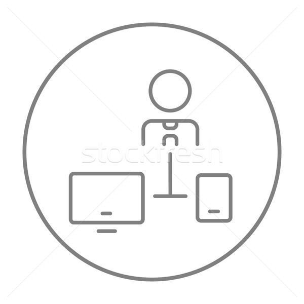 Stock photo: Man linked with computer and phone line icon.