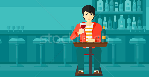 Man sitting at bar. Stock photo © RAStudio