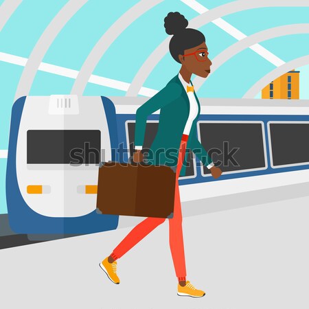 Woman going out of train. Stock photo © RAStudio