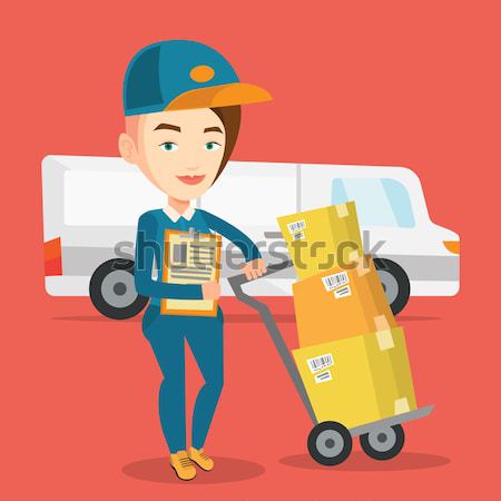 Stock photo: Delivery courier with cardboard boxes.