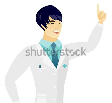 Young asian doctor with speech bubble. Stock photo © RAStudio