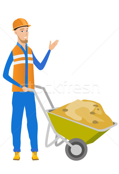 Young caucasian builder giving thumb up. Stock photo © RAStudio