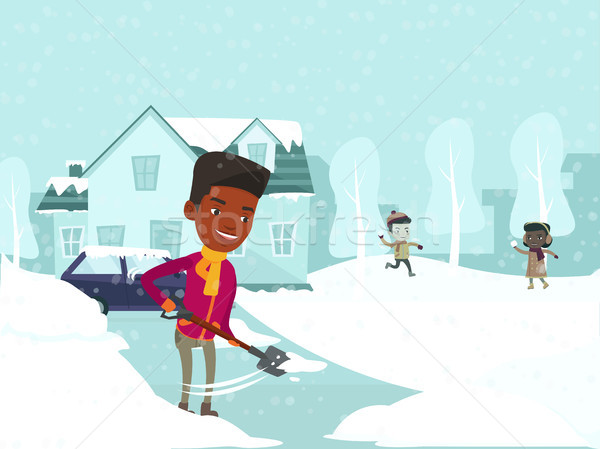 Father removing snow while kids playing snowballs. Stock photo © RAStudio