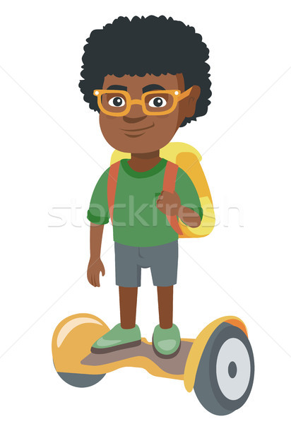 African schoolboy riding on gyroboard to school. Stock photo © RAStudio