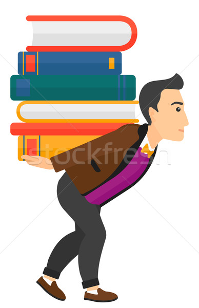 Man with pile of books. Stock photo © RAStudio
