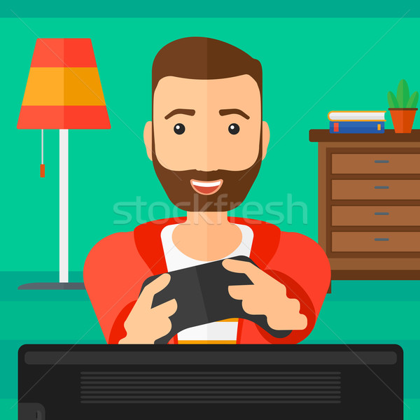 Man playing video game. Stock photo © RAStudio