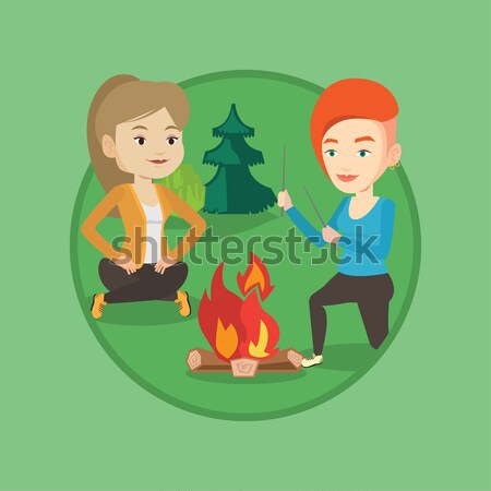 Deux amis séance autour feu de joie camping [[stock_photo]] © RAStudio