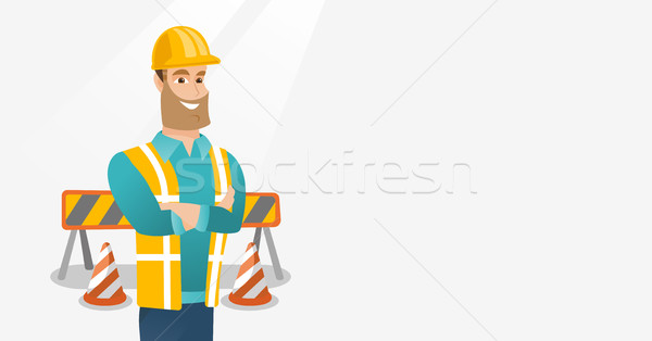 Confident builder with arms crossed. Stock photo © RAStudio