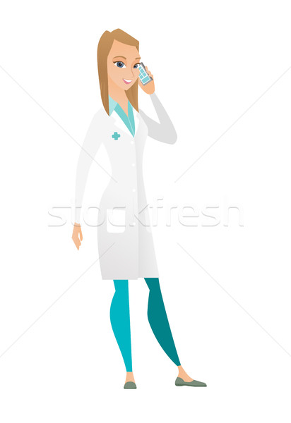 Medico parlando cellulare felice uniforme Foto d'archivio © RAStudio