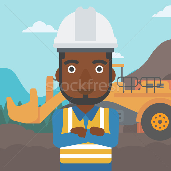 Miner with mining equipment on background. Stock photo © RAStudio