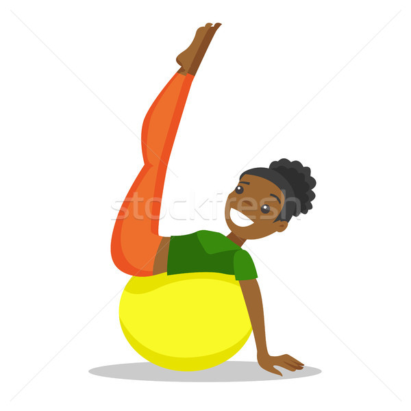 African-american woman exercising with fit ball. Stock photo © RAStudio