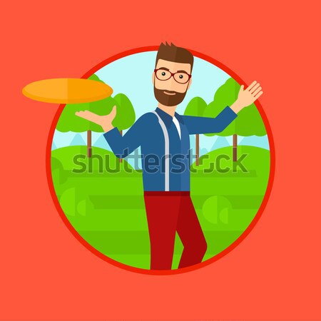 Man playing frisbee. Stock photo © RAStudio