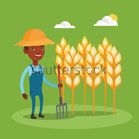 Farmer with pitchfork vector illustration. Stock photo © RAStudio