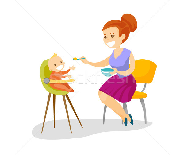 Young caucasian white mother feeding her baby. Stock photo © RAStudio