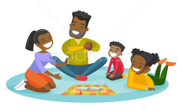 Young african-american family playing board game. Stock photo © RAStudio