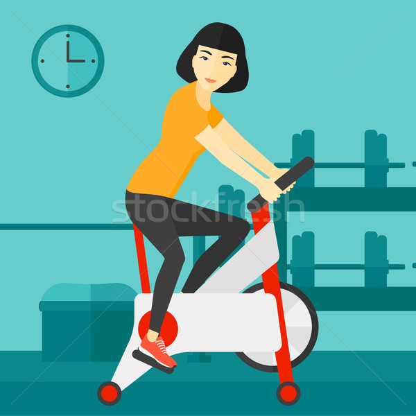 Femme vélo exercice asian [[stock_photo]] © RAStudio