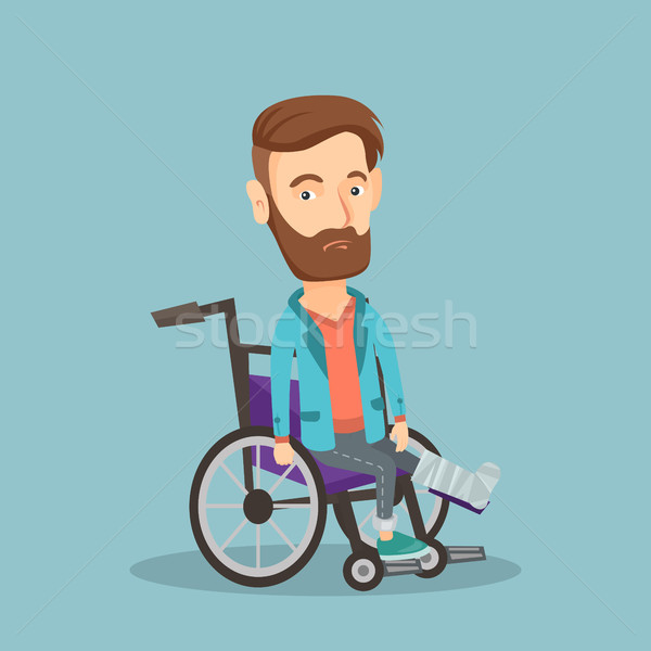 Man with broken leg sitting in wheelchair. Stock photo © RAStudio