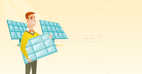 Man holding solar panel vector illustration. Stock photo © RAStudio