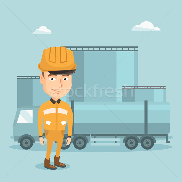 Worker on background of fuel truck and oil plant. Stock photo © RAStudio