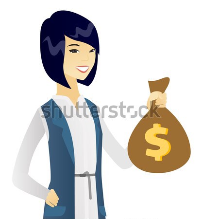 Caucasian stewardess holding a money bag. Stock photo © RAStudio