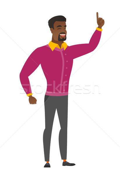 African businessman pointing with his forefinger Stock photo © RAStudio