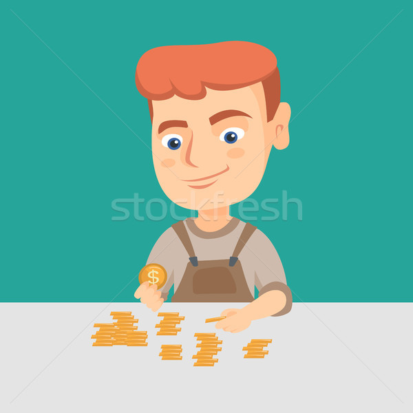 Caucasian boy counting coins on the table. Stock photo © RAStudio