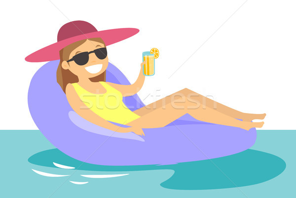 Caucasian white woman relaxing in swimming pool. Stock photo © RAStudio