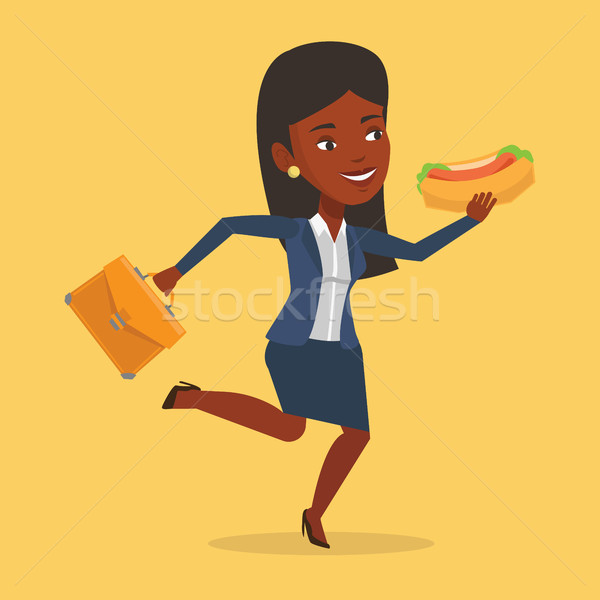 Femme d'affaires manger hot dog dépêchez serviette courir [[stock_photo]] © RAStudio