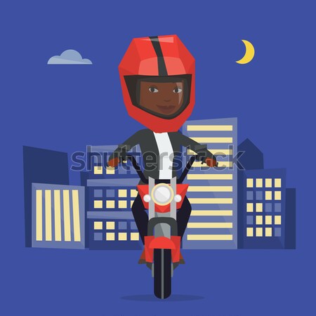 Woman riding motorcycle at night. Stock photo © RAStudio