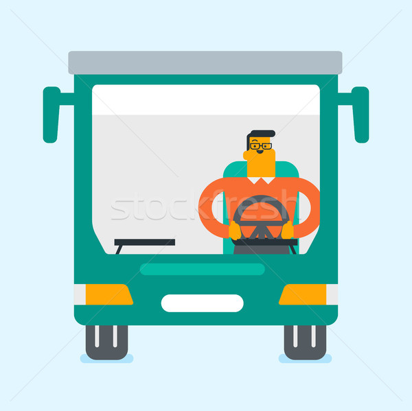 Caucasian bus driver sitting at steering wheel. Stock photo © RAStudio