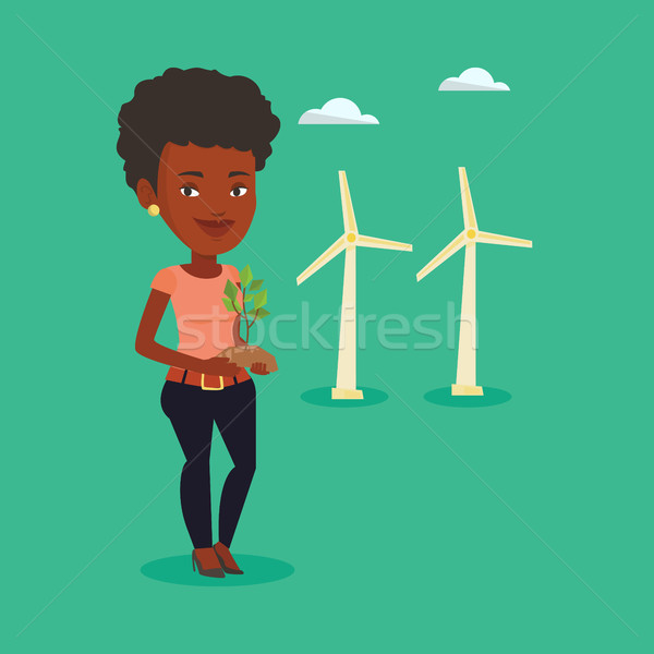 Woman holding small plant vector illustration. Stock photo © RAStudio