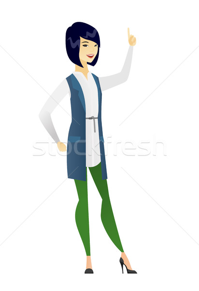 Business woman pointing with her forefinger. Stock photo © RAStudio