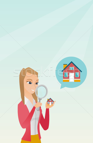 Young caucasian woman looking for a house. Stock photo © RAStudio