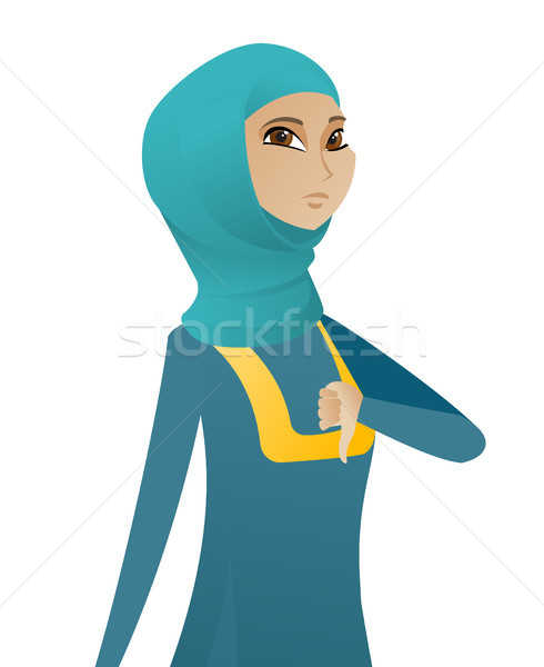 Disappointed muslim business woman with thumb down Stock photo © RAStudio