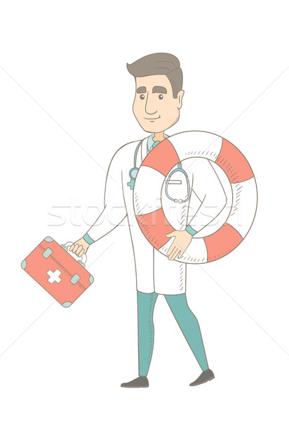 Paramedic running with first aid box and lifebuoy. Stock photo © RAStudio