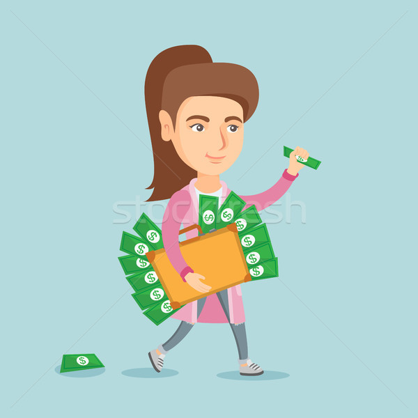 Executive manager with briefcase full of money. Stock photo © RAStudio